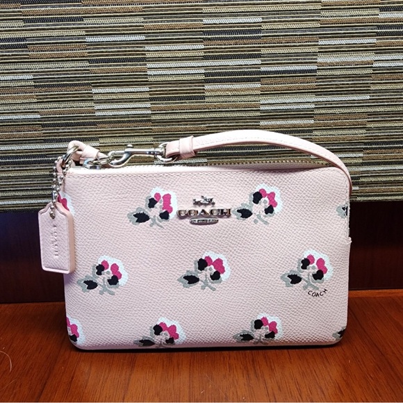 Coach Handbags - NWOT Coach Light Pink Floral Zip Wristlet